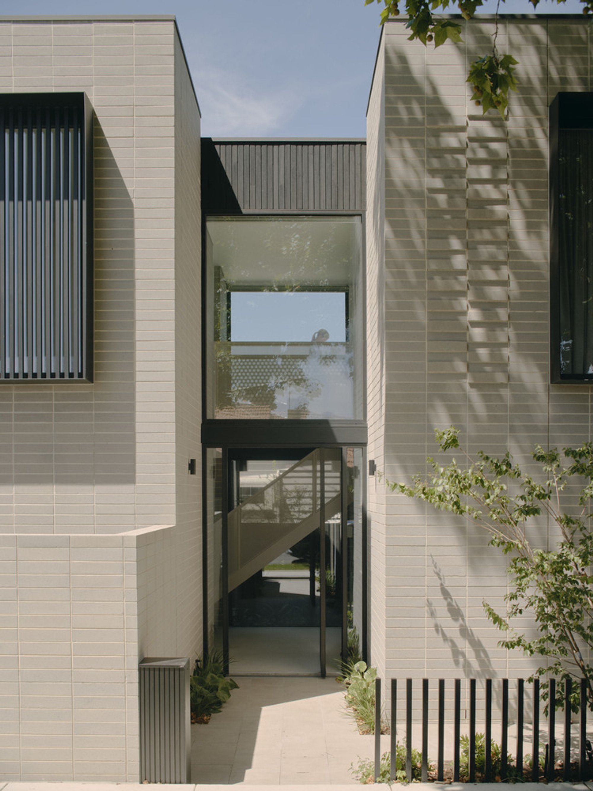 C.Kairouz Architects Carves a Brick Family Home Around a Central Light Well in Melbourne
