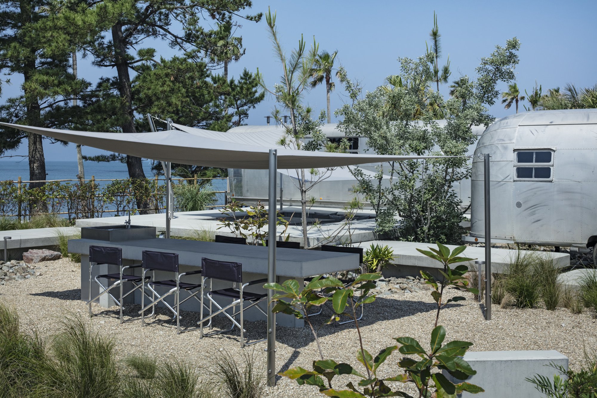 DDAA Splits a Home Across Five Vintage Trailers for a Nomadic Hotel in Miyazaki