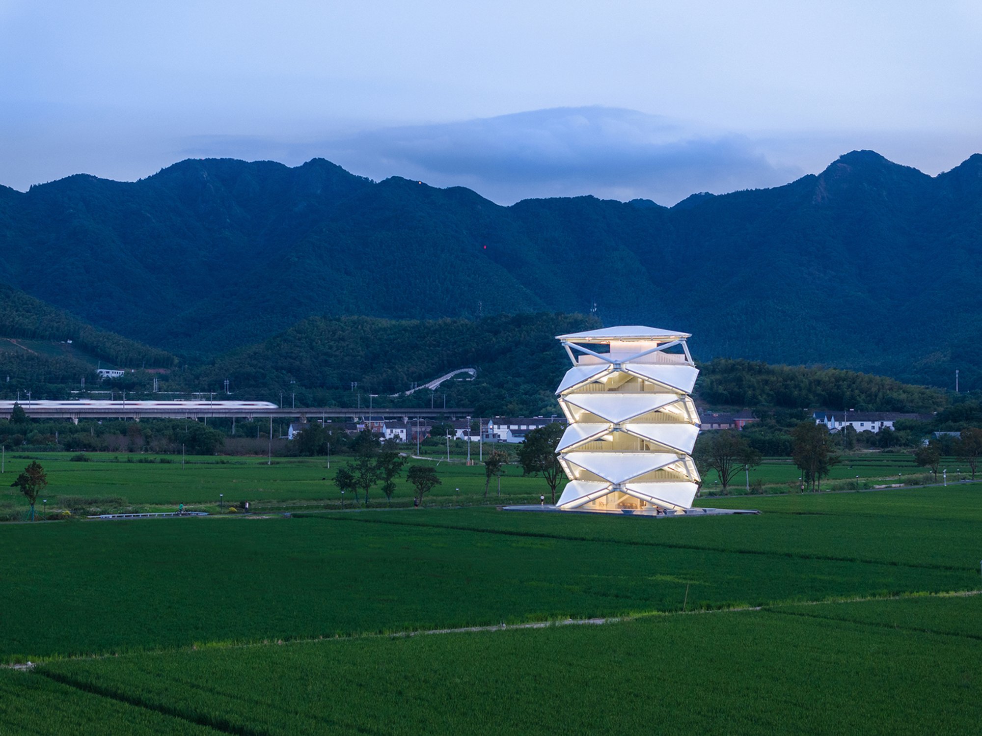 HDEC AIR-CoLAB Studio Stacks a 23-Meter Lantern Tower Above the Rice Paddies of Ningbo