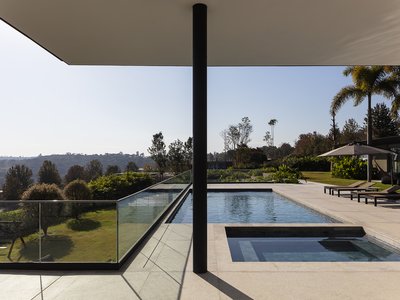 Gálvez & Márton Drape a Metal Roof Over the Brazilian Hillside to Frame the Sunset