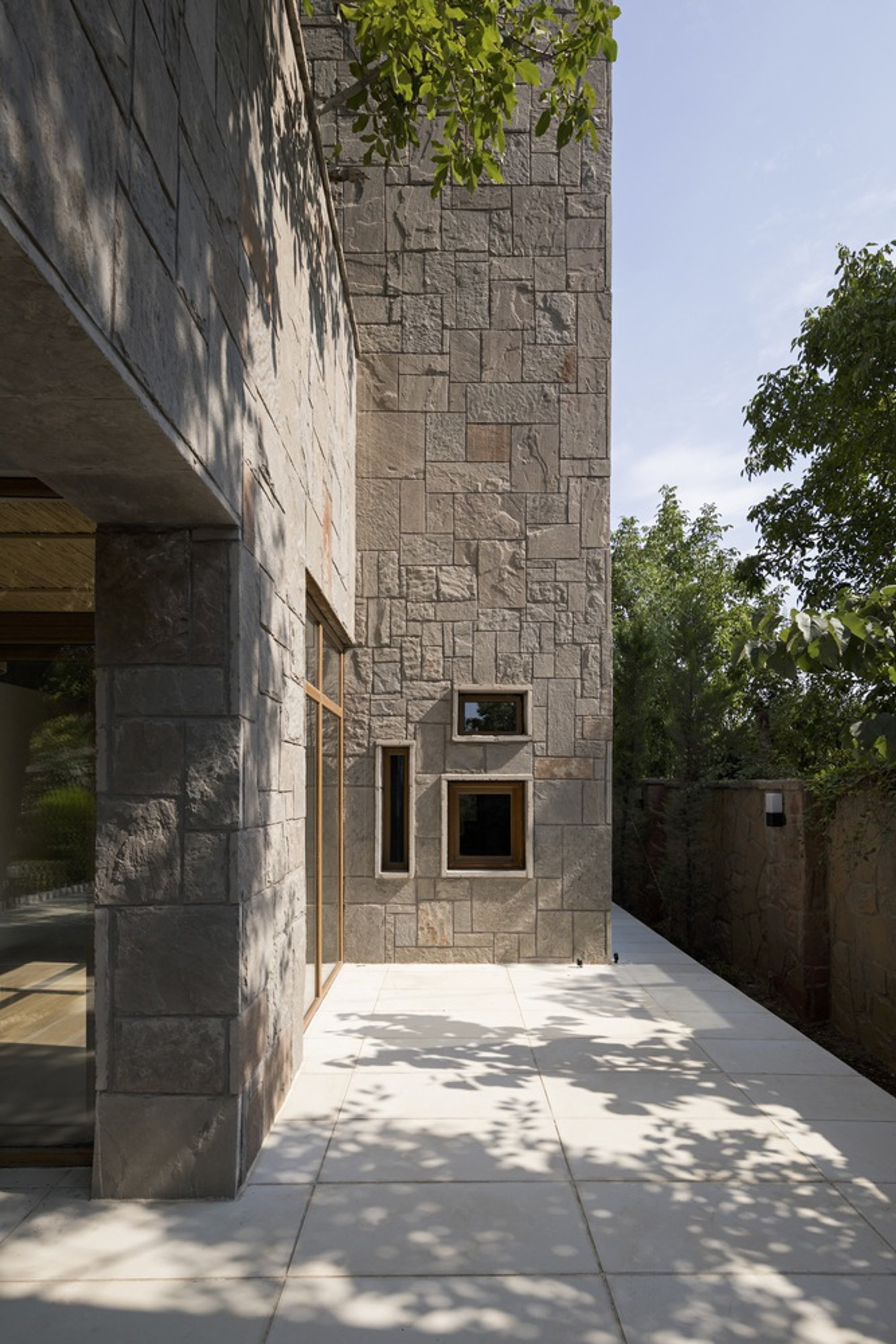 KAV Architects Wraps a House Around Two Walnut Trees in an Iranian Mountain Village