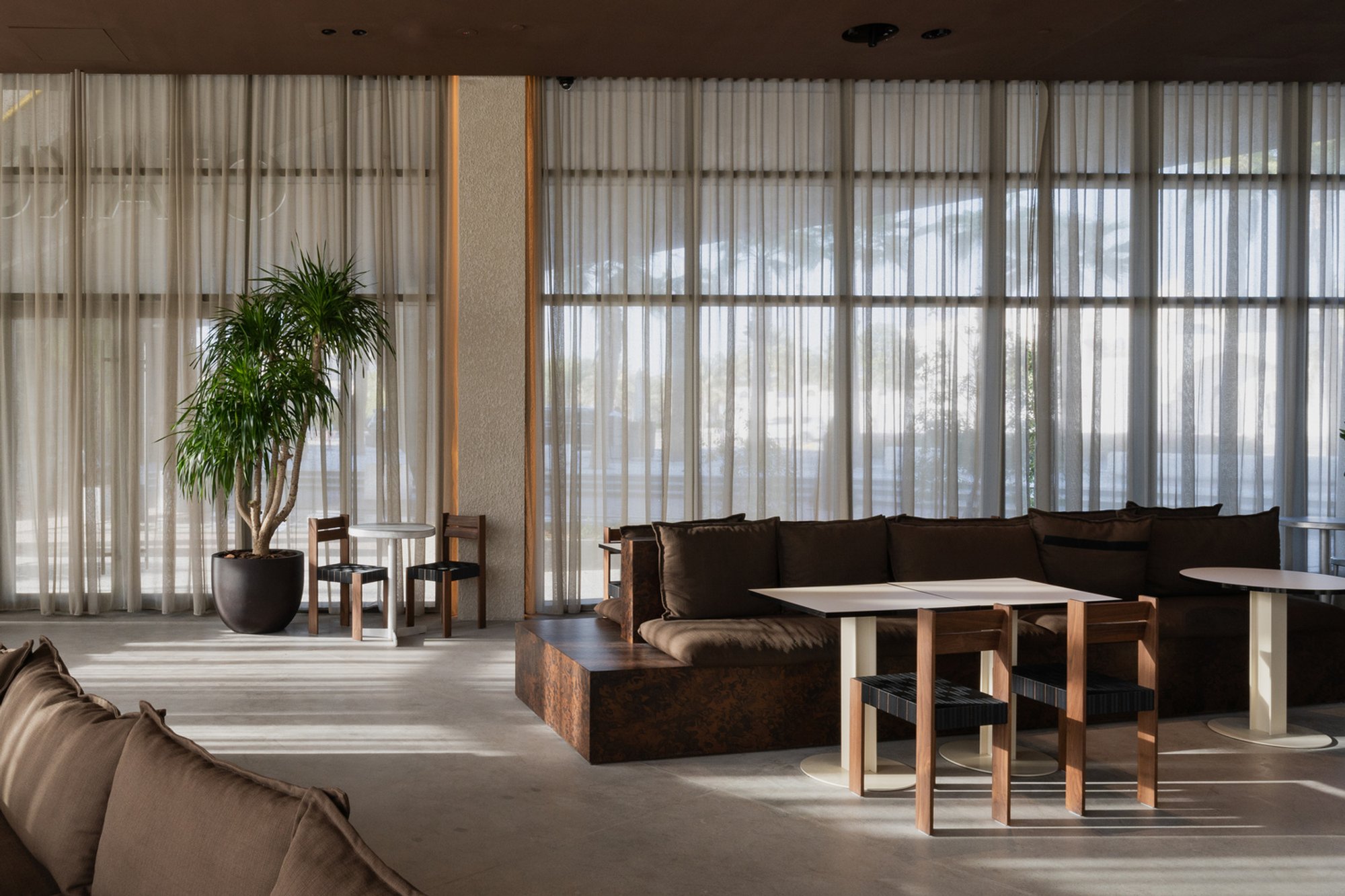 Otaku Cafe: A Wabi-Sabi Cafe Design Blending Brutalist Aesthetics with Organic Warmth