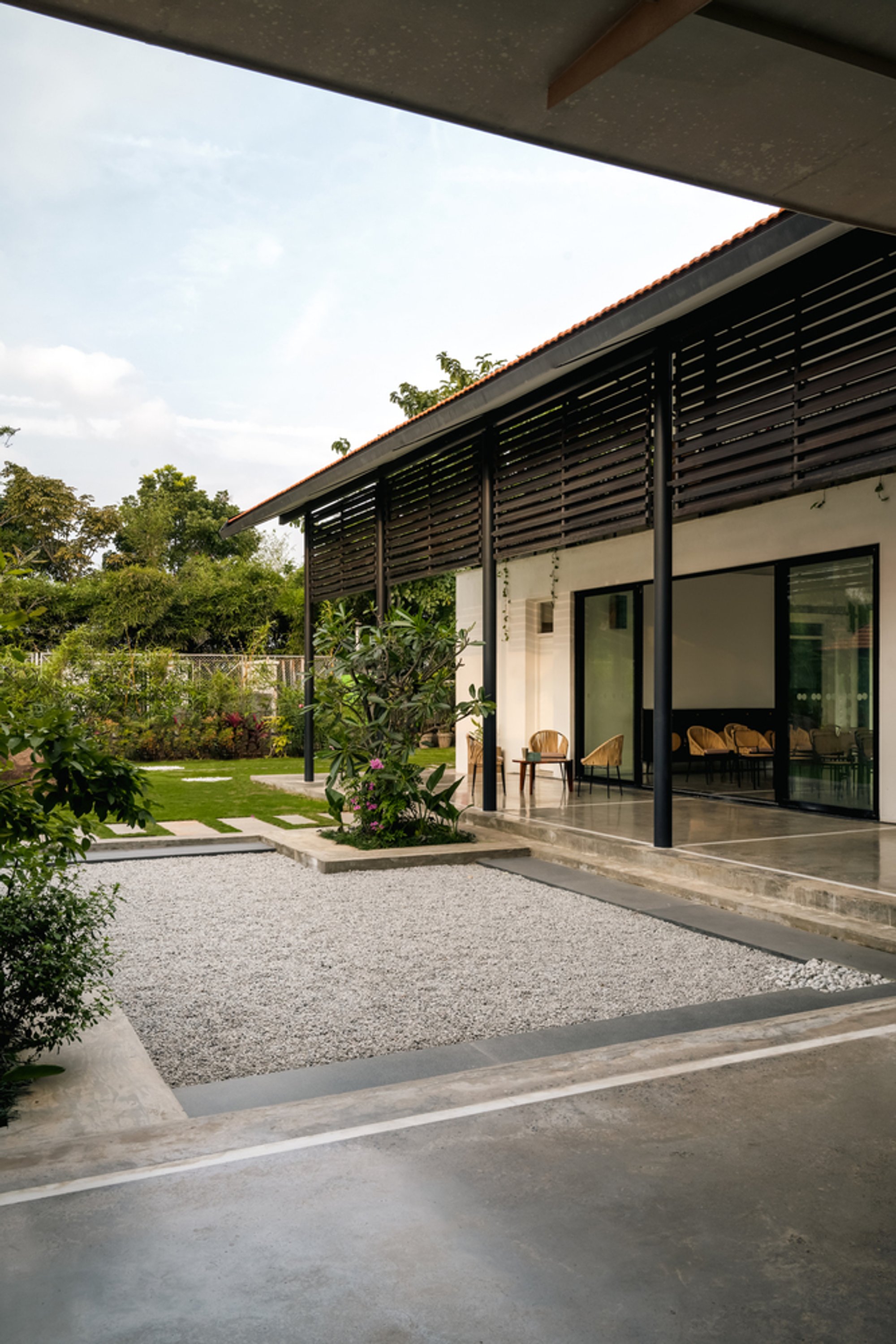 STUDIO MOTLEY Wraps a Bangalore Fitness Club in Deep Eaves and Courtyards