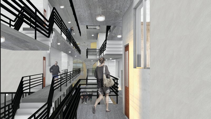Interior corridor with black metal railings and bridges connecting multiple levels with figures walking