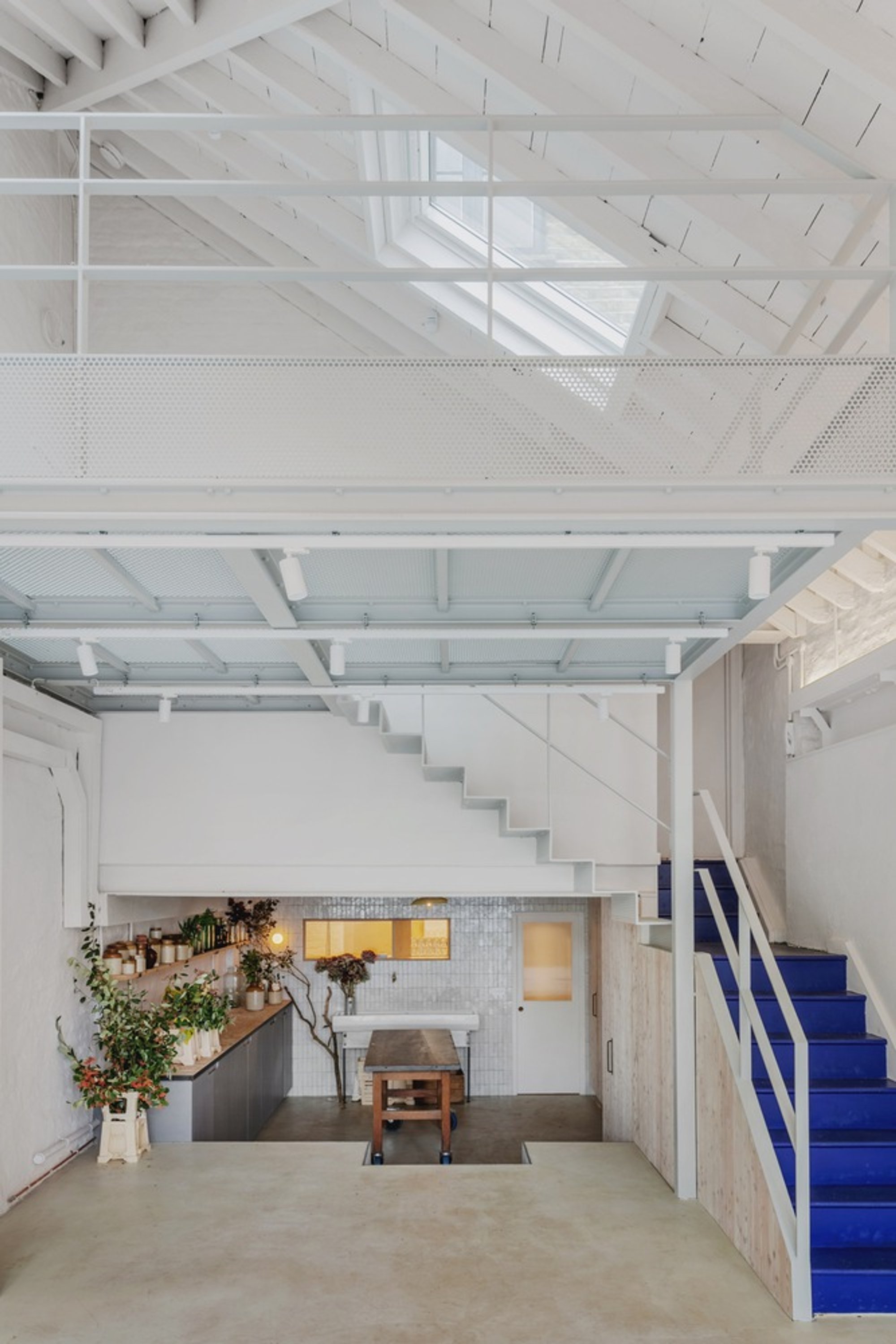 Trellik Design Studio Packs a Co-Working Hub, Café, and Workshop into 124 Square Meters of Victorian Shell