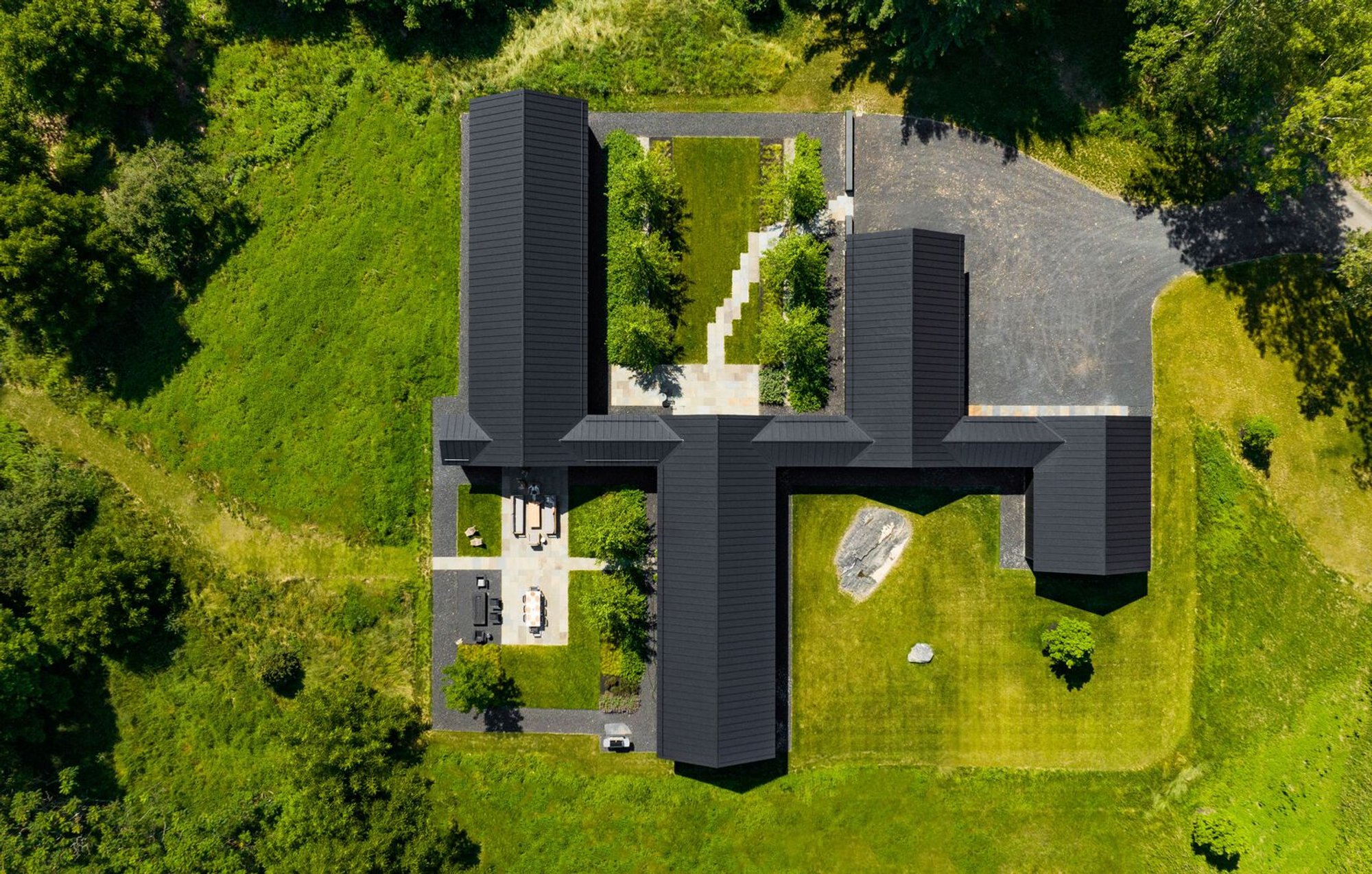 Birdseye Architects Scatter Four Black Gables Across a Vermont Meadow to Reimagine the Farmstead