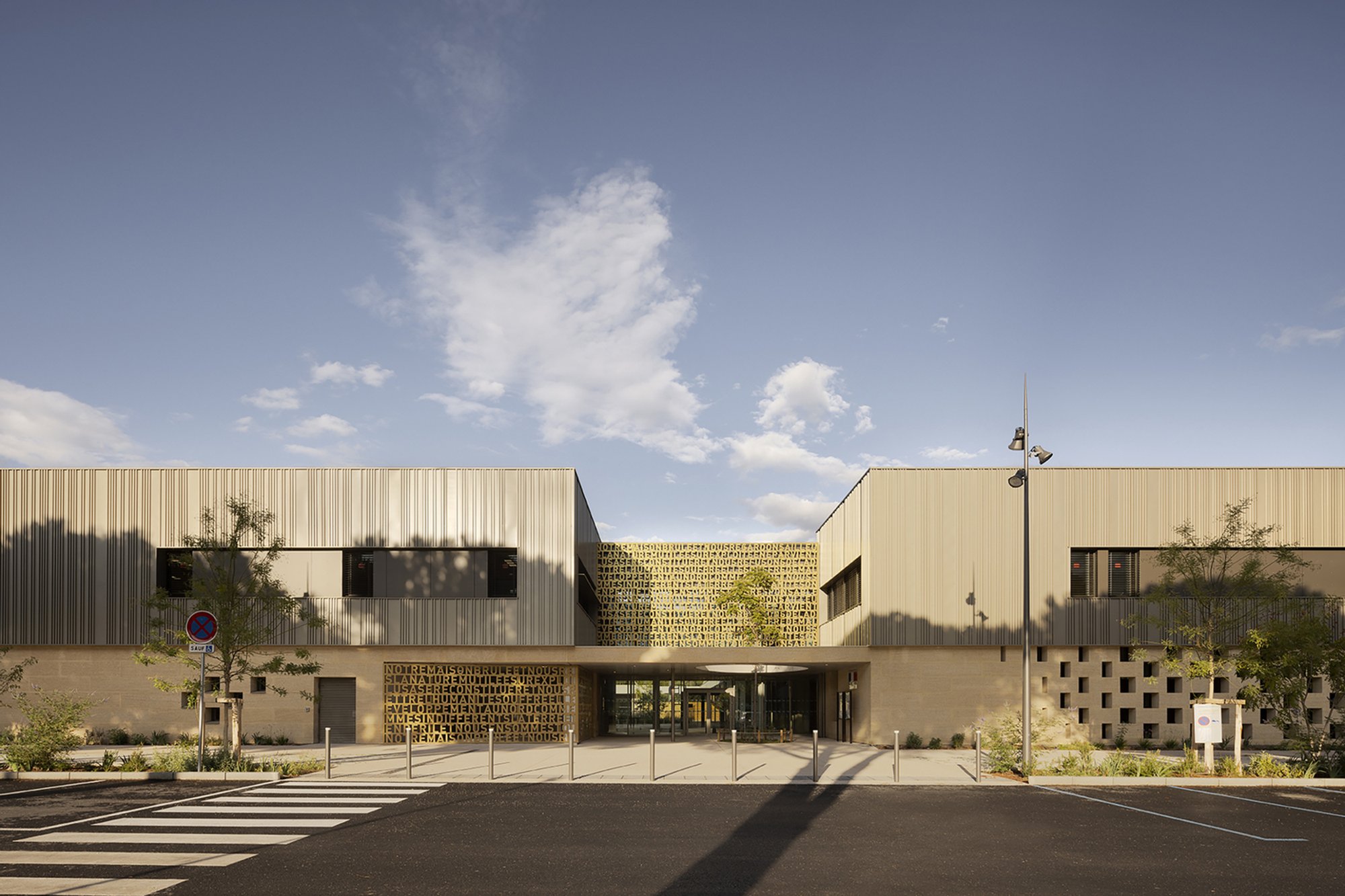 Jacques Chirac School & Gymnasium by BPA Architecture: A Sustainable Educational Landmark