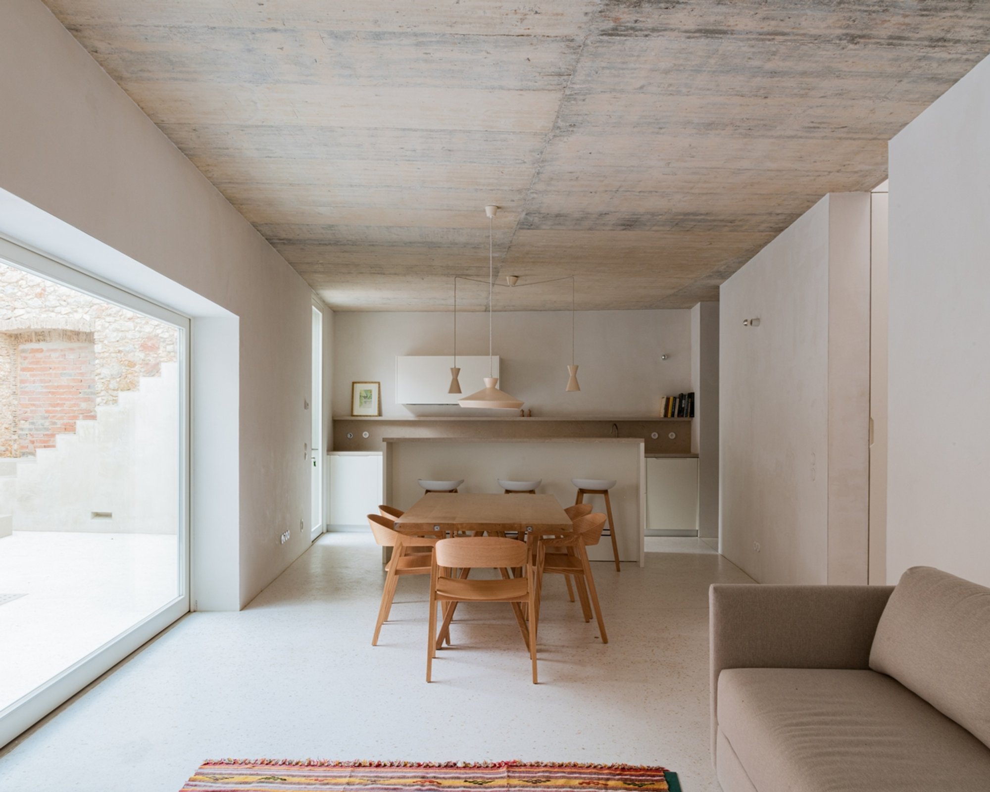Residential Renovation in Olhão: Preserving Industrial History While Embracing Modern Design