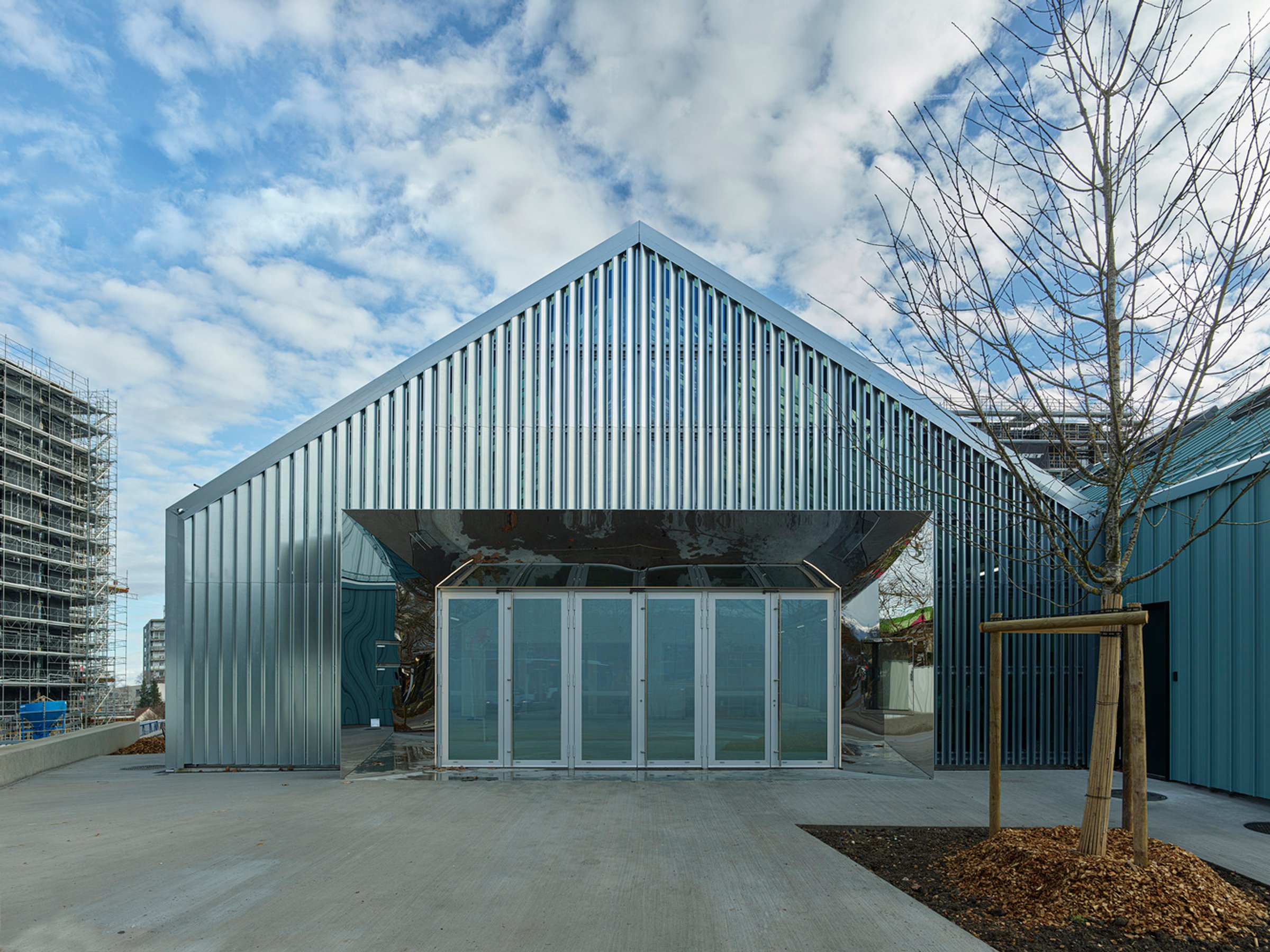 Sustainable Community Architecture: The Vision Behind Libellules Community Center by Acau Architecture