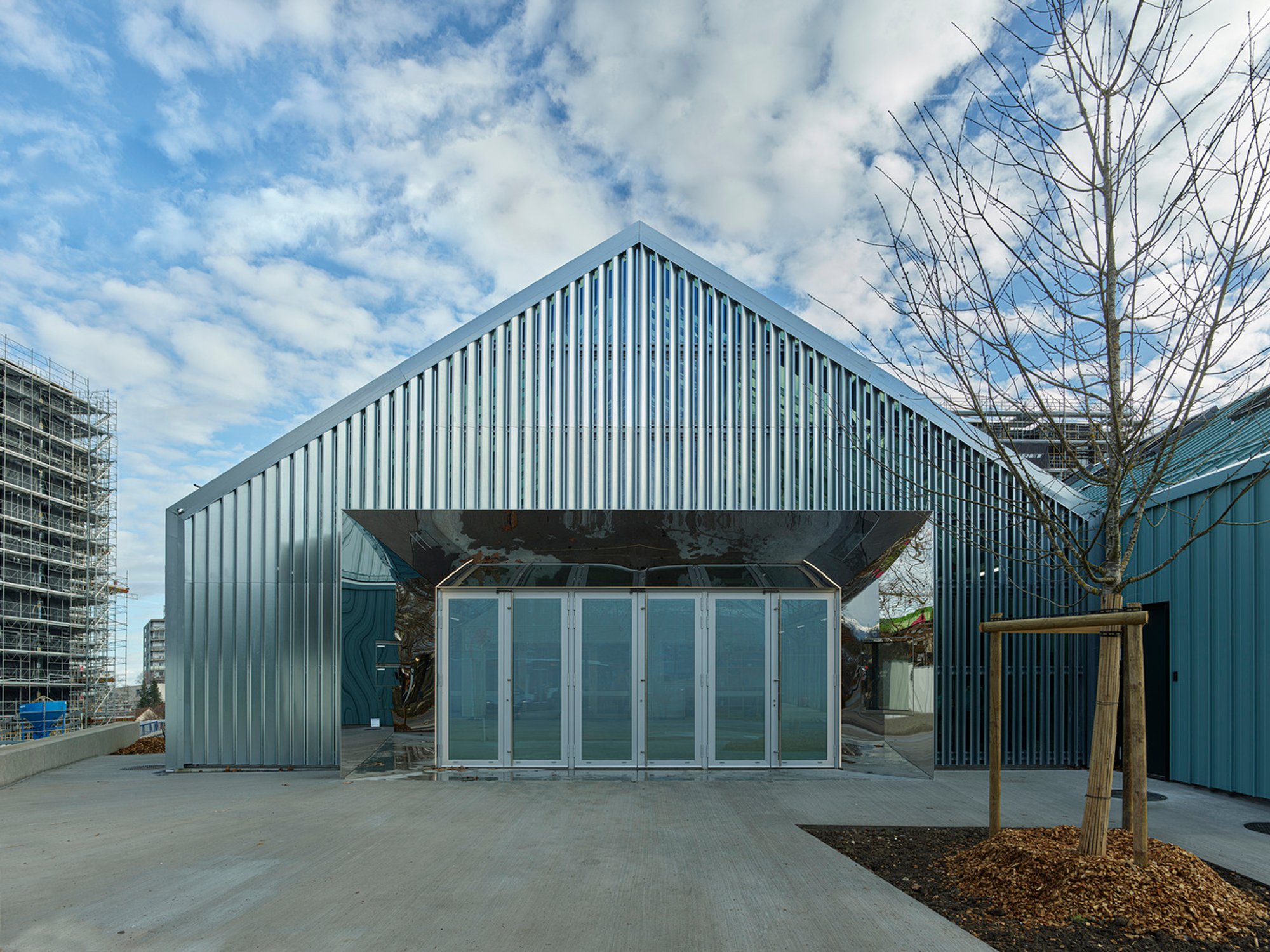 Sustainable Community Architecture: The Vision Behind Libellules Community Center by Acau Architecture