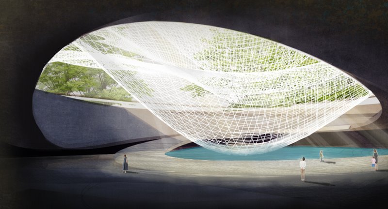 A Sacred Space Below – A tranquil underground memorial illuminated by natural light and greenery.