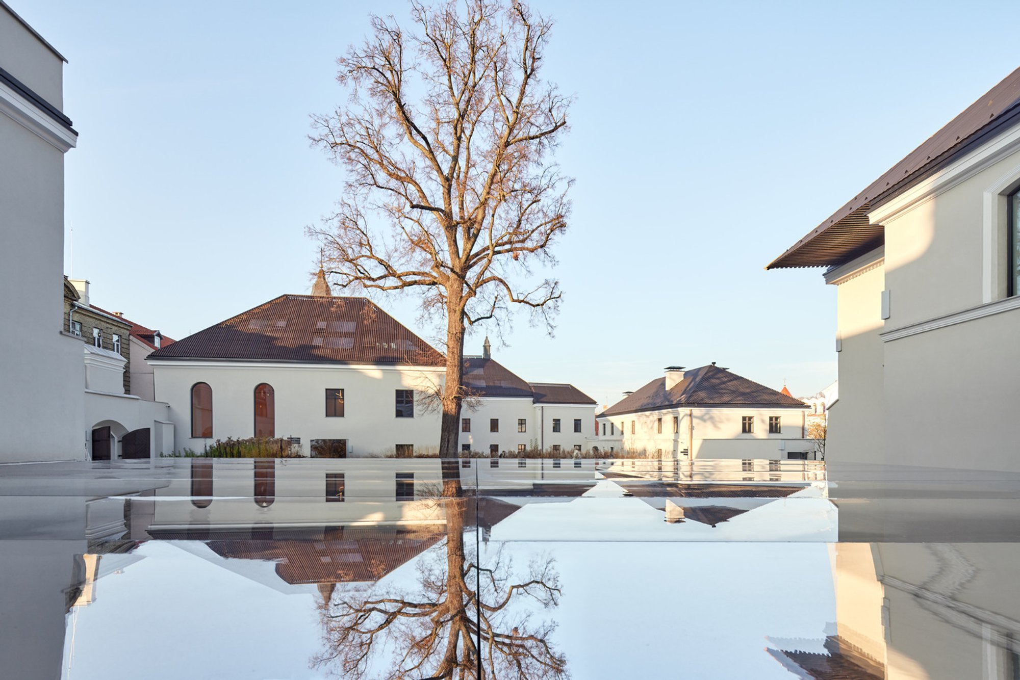 Heritage Adaptive Reuse Architecture: Boksto Skveras Mixed-Use Center by Studio Seilern Architects