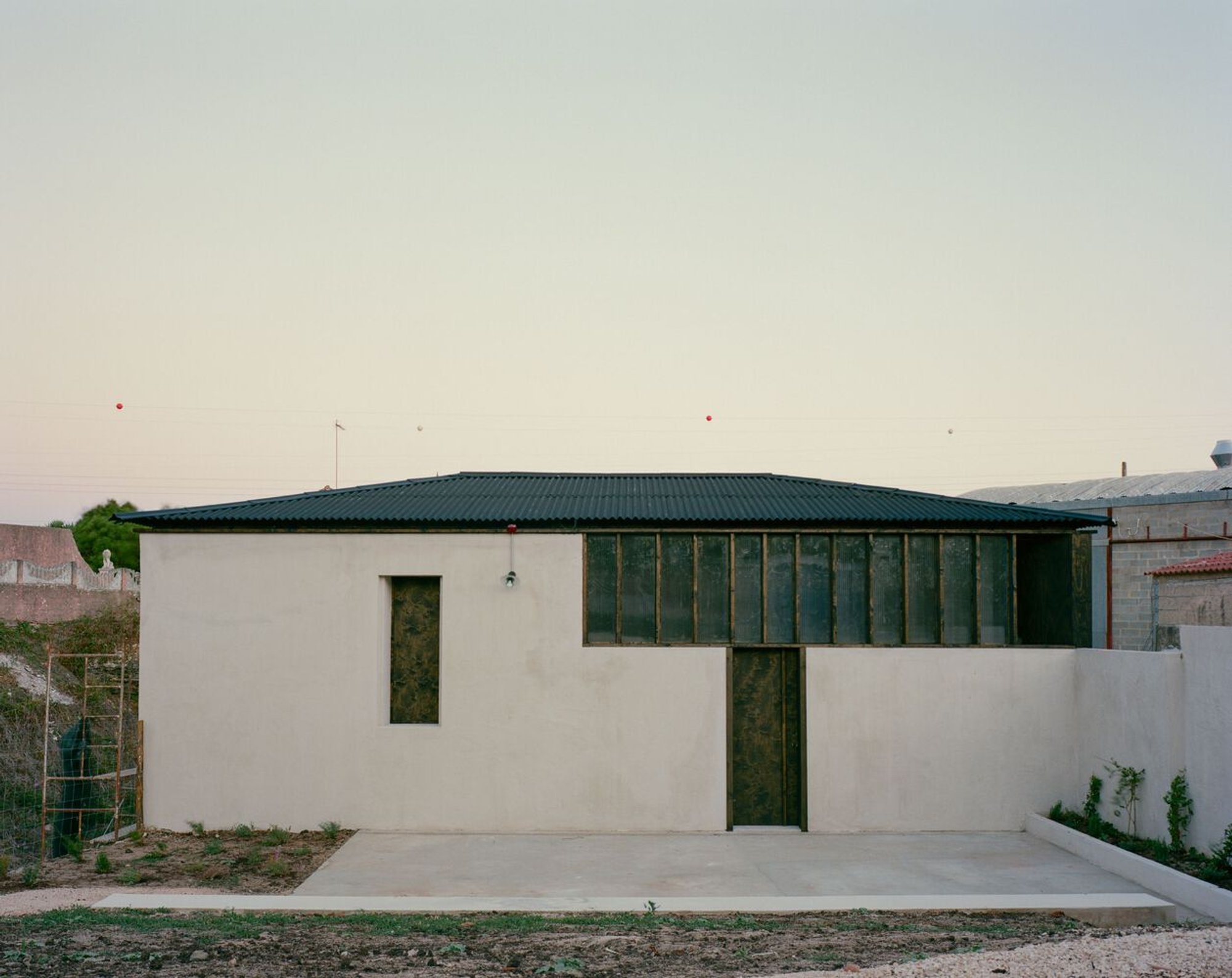 Mogos Scout School Headquarters: A Fusion of Heritage and Sustainable Design