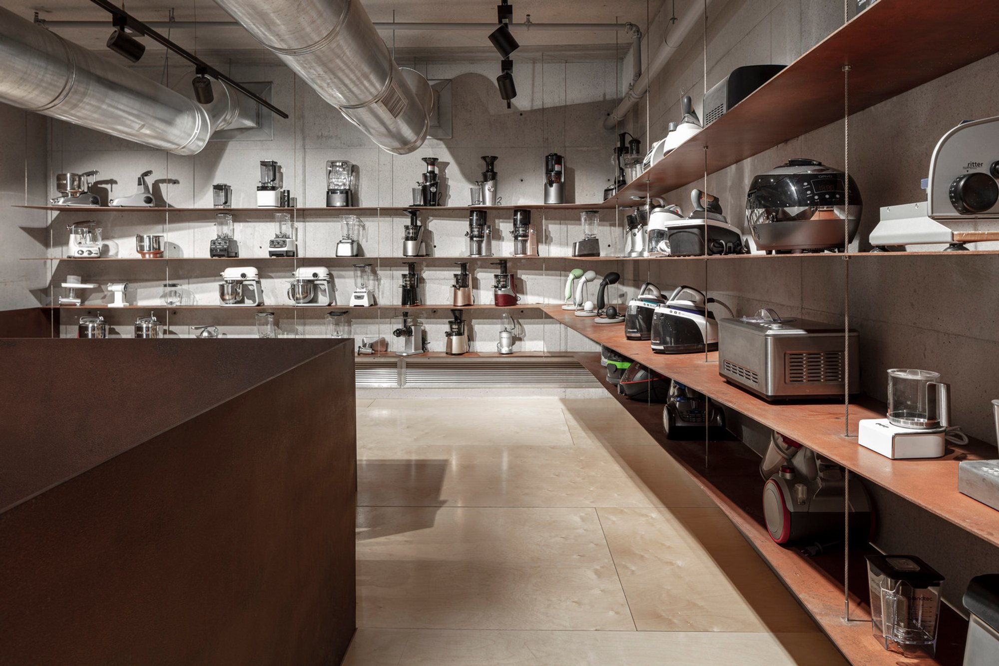 OIG Showroom & Demo Hall by Tal Goldsmith Fish Design Studio: A Minimalist Space for Culinary Innovation