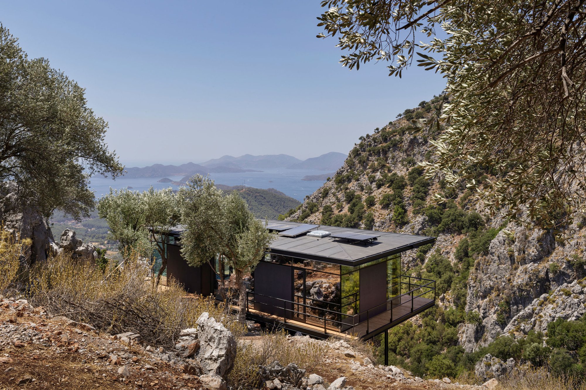 Sustainable Minimalist House Design: G House by PIN Architects