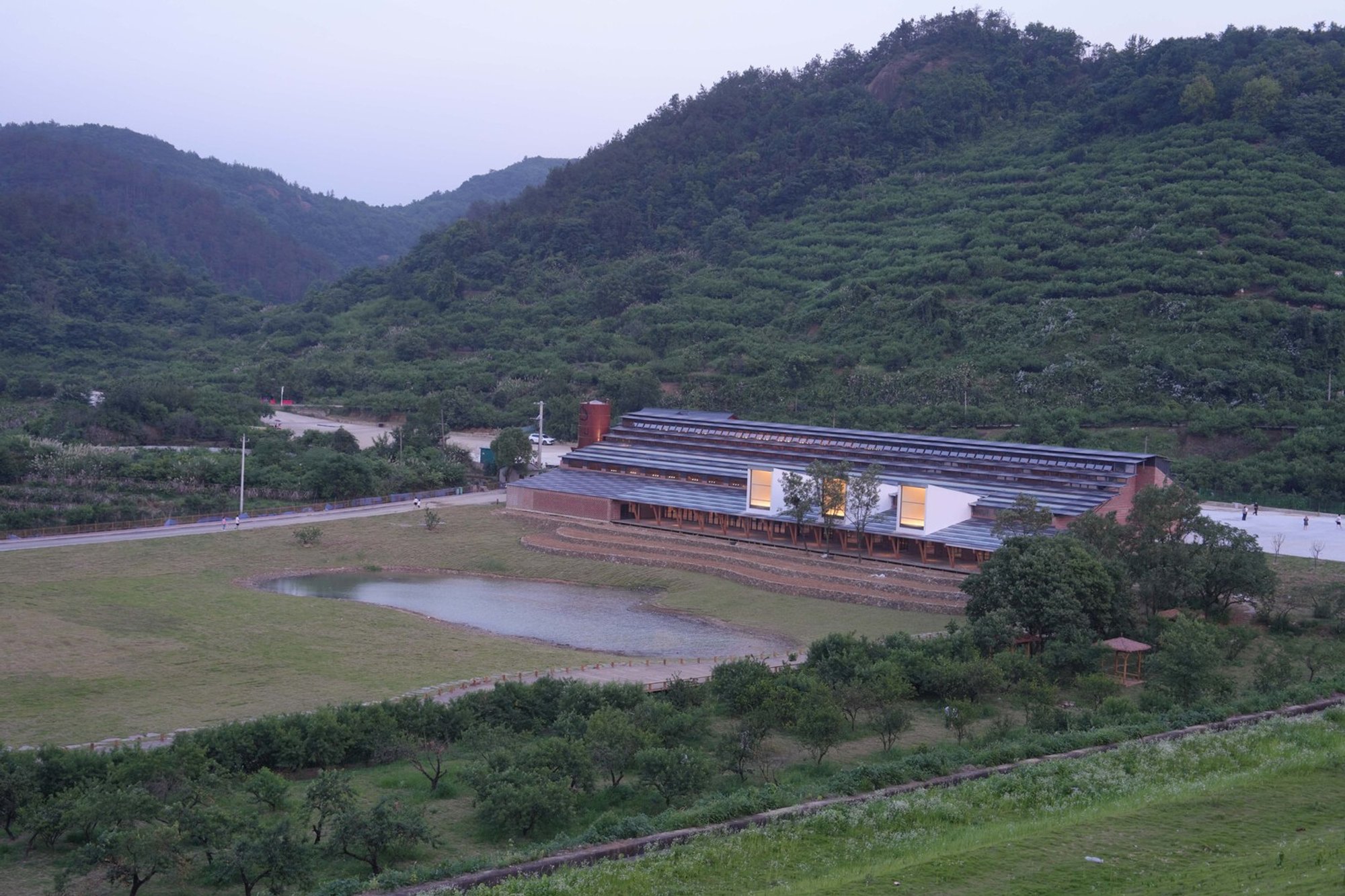 Adaptive Reuse in Rural Architecture: Taoli-Zhaoshan Village Center by THAD SUP Atelier
