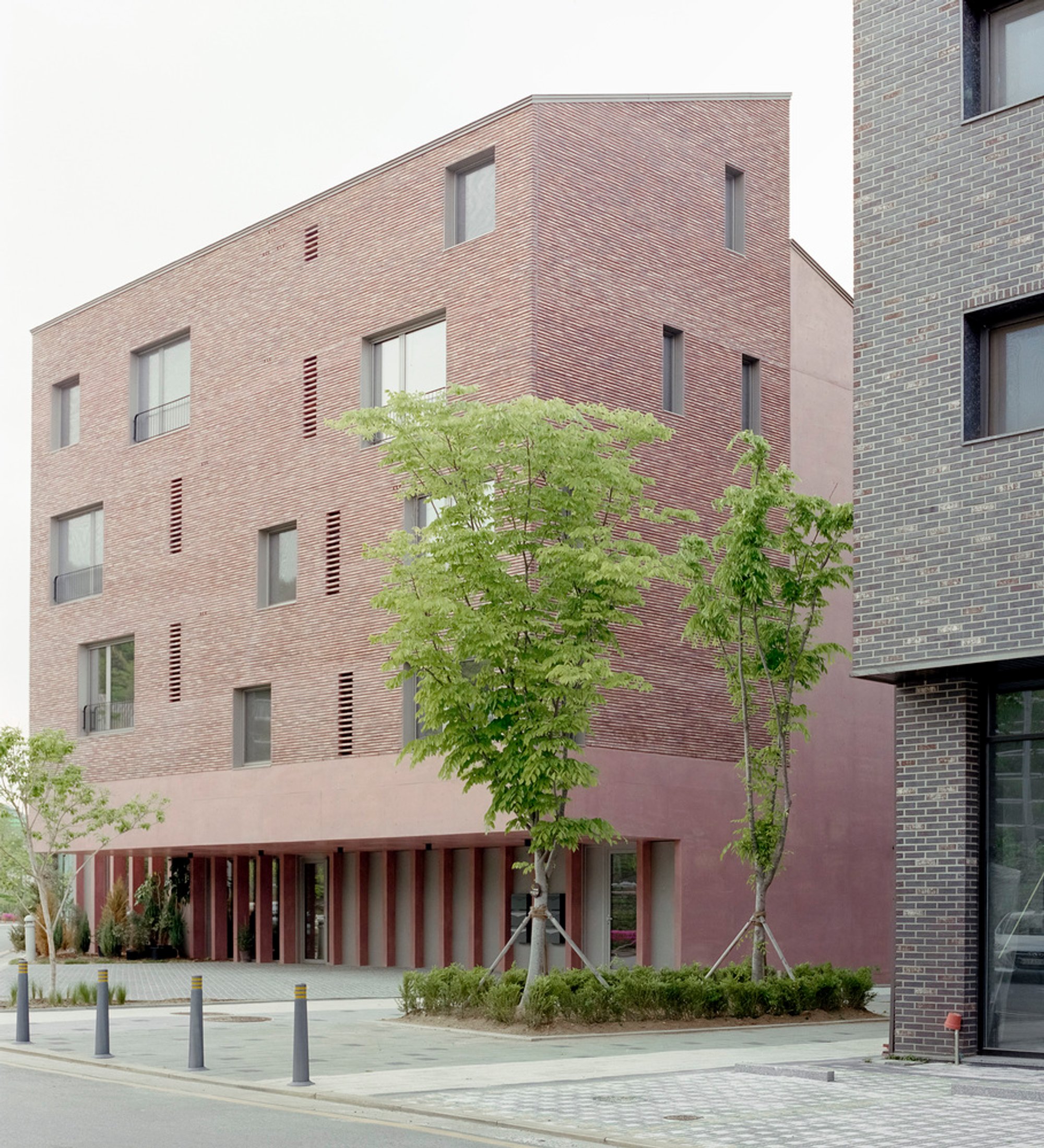 GODUNG Office & Apartments Building by Stocker Lee Architetti – Long Form Article