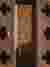 This architectural image showcases a brick wall with a distinctive lattice pattern. The bricks are a