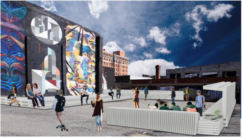 Bloc modules creating interactive seating in a mural-filled public square.