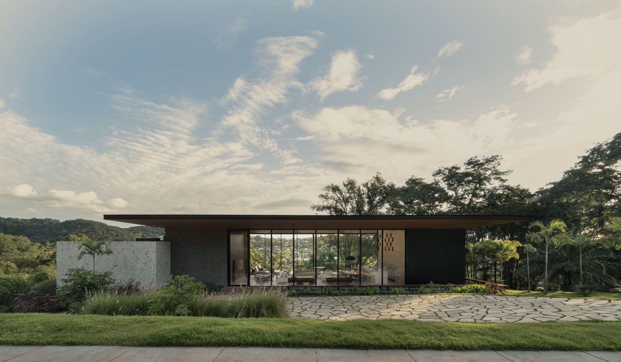 Assais House by Riccioppo Arquitetura: A Tropical Minimalist Retreat in Goiânia