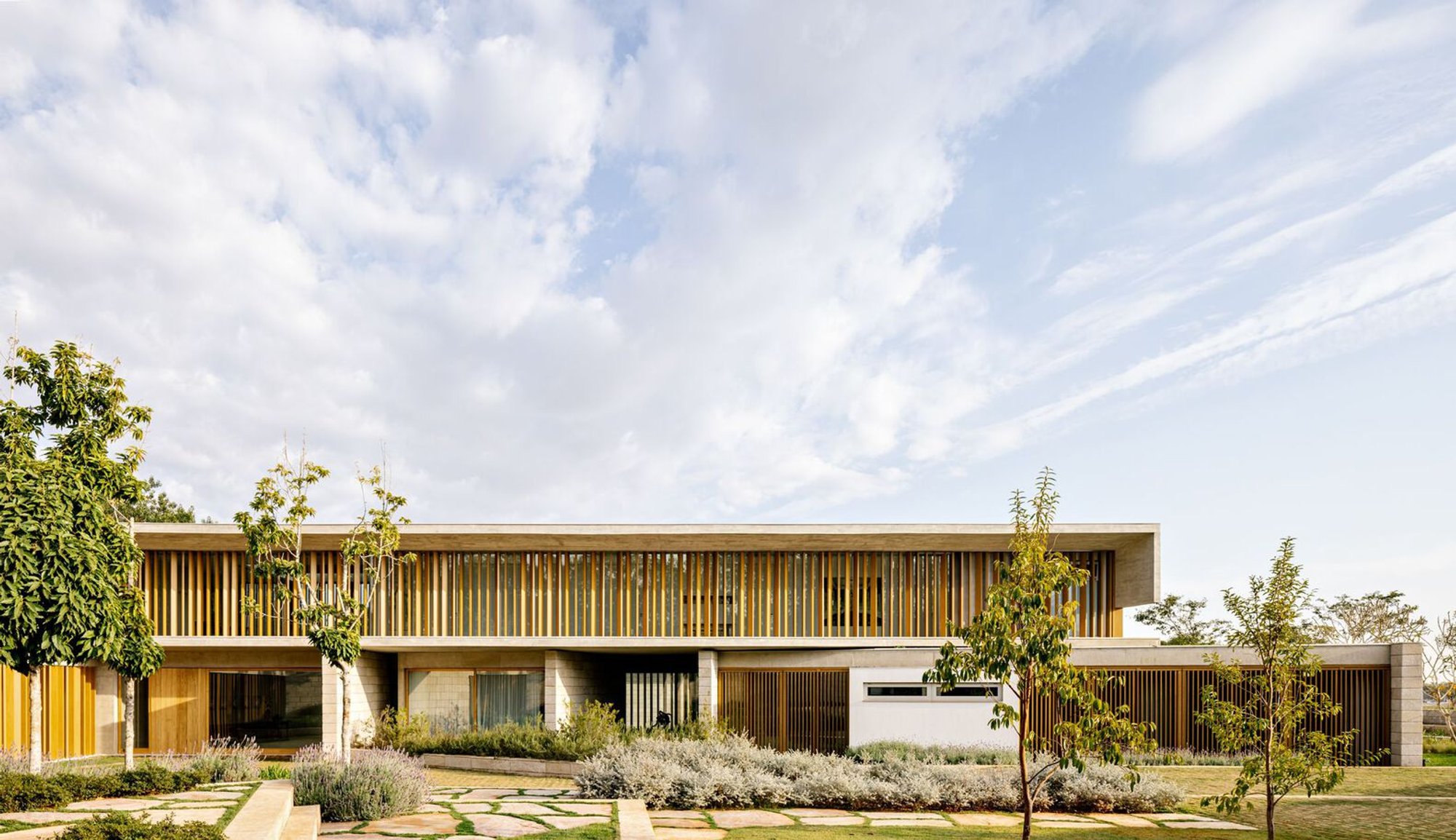 Topography-Driven Architecture: The Bosque House by FGMF