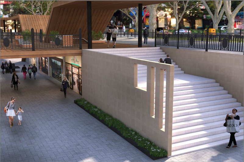 Steps connect the shopping plaza with the pedestrian street, merging movement and leisure.