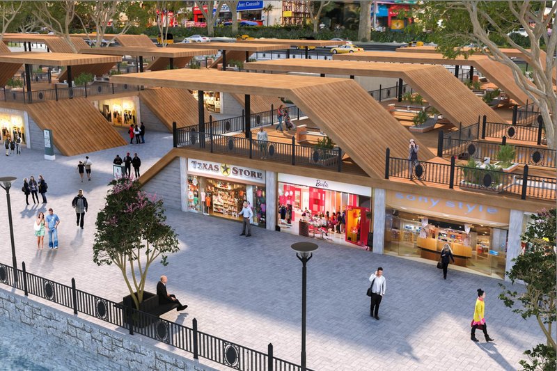 Ground-level shops and upper decks form a lively and accessible urban plaza.