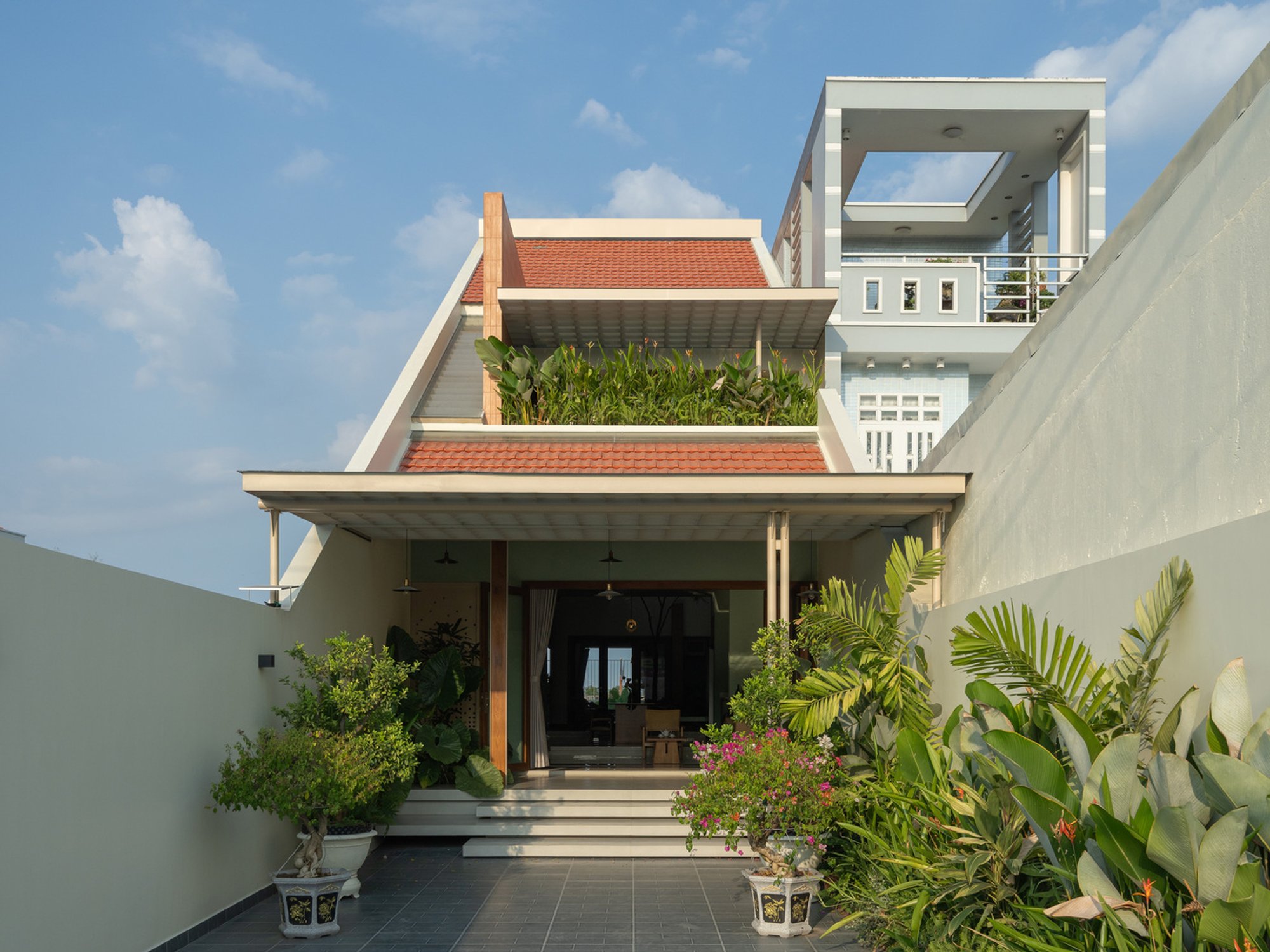 Aunt Four’s House by AHA Architects – A Modern Interpretation of Southern Vietnamese Tradition