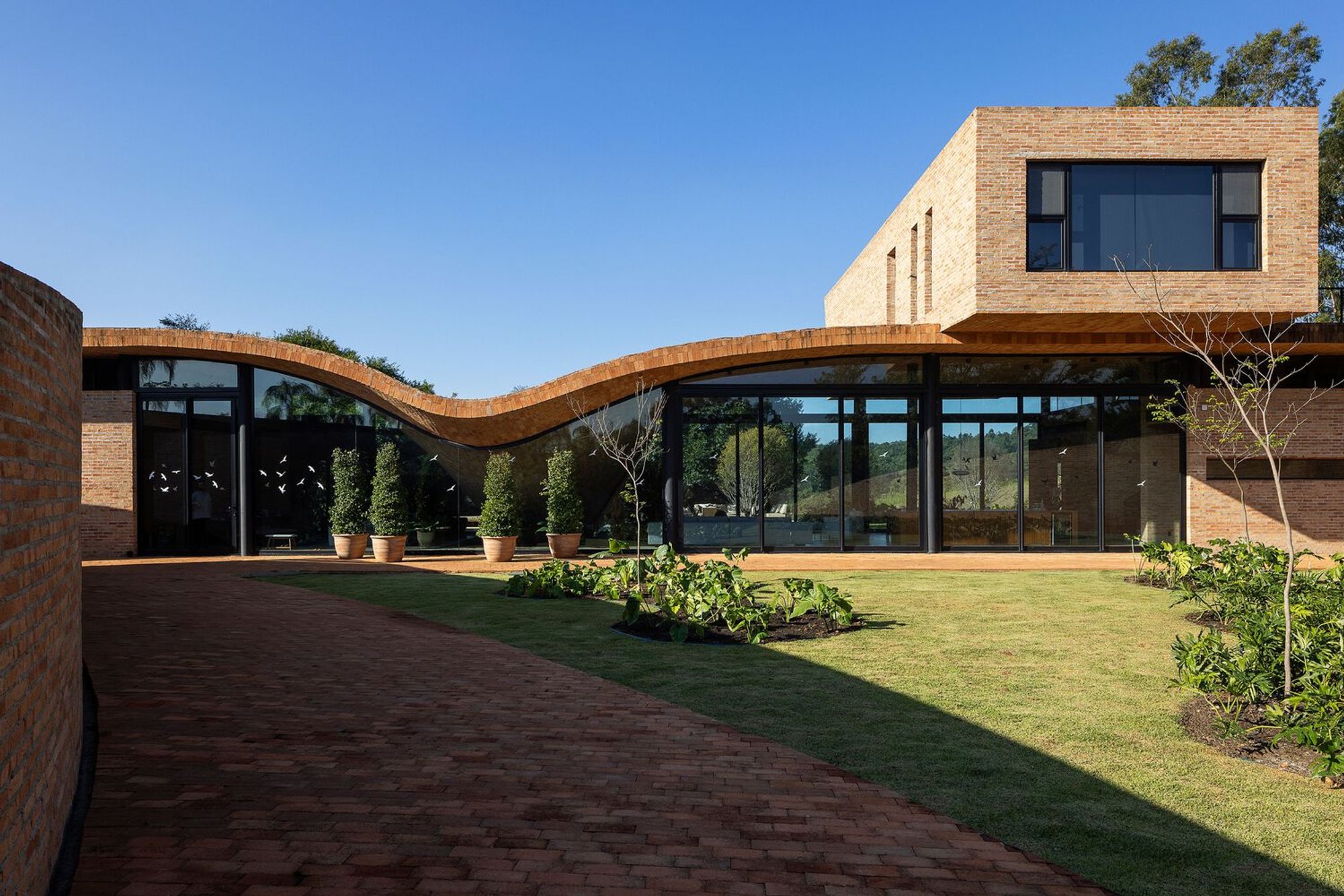 Passive House by Mareines Arquitetura: Sustainable Living in Harmony with Nature