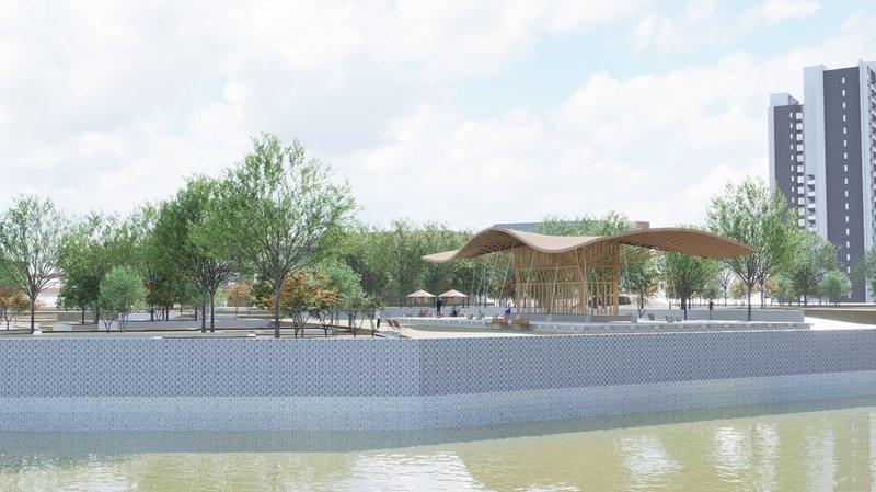 Aerial view demonstrating how the bamboo pavilion blends with greenery and water, emphasizing its sustainable design approach.