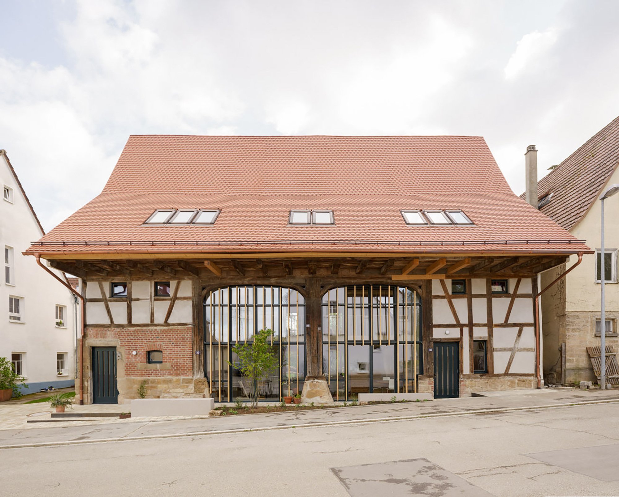 Doppelscheune – A Historic Barn Transformed into a Modern Residential Building by KO/OK Architektur