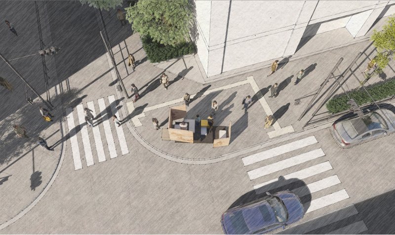Aerial view showing the vessel anchoring the pedestrian intersection as a social and cultural node.