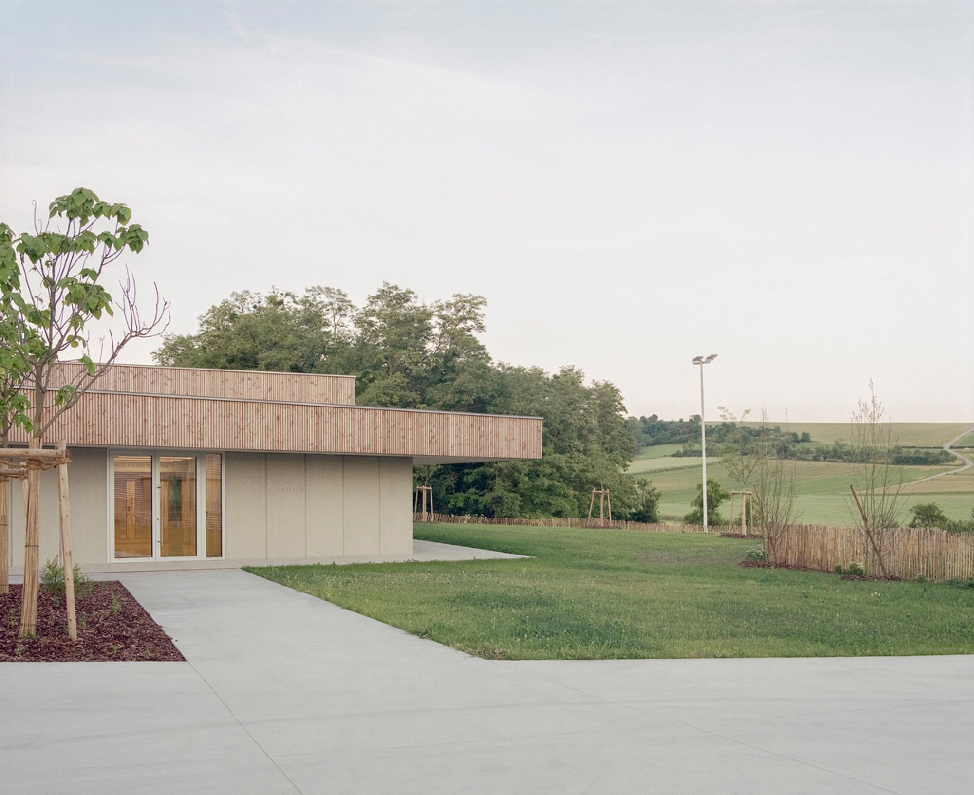 Willgottheim–Woellenheim Multipurpose Hall by rhb architectes: A Landscape-Embedded Community Hub in Rural France