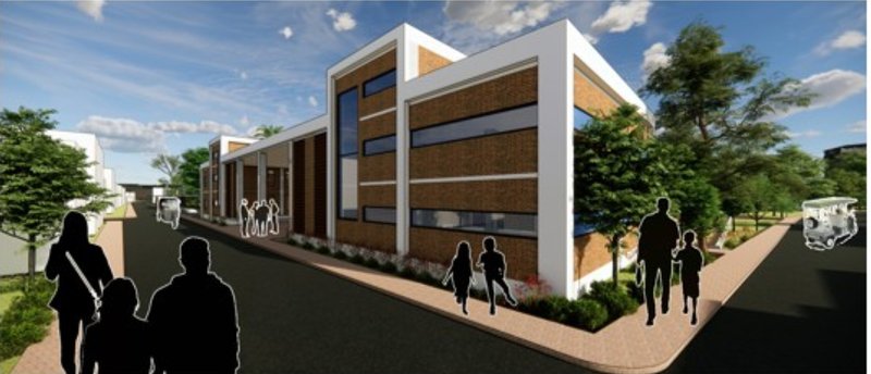 A modern reinterpretation of industrial typology—clean lines, brick façades, and vertical glazing expressing continuity and renewal.