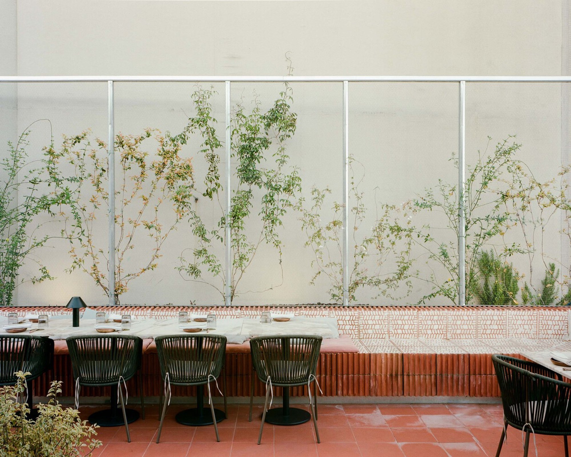 Norma Restaurant by HUGOSANTOALHA: A Dialogue Between Shelter and Exposure in Guimarães