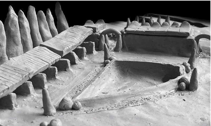 Clay model of the domed entryway framed by cypress trees—an architectural gesture of welcome and hope.