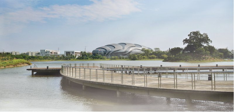 The curved walkway around the lake connects various activity zones — a potential core of future public interaction.
