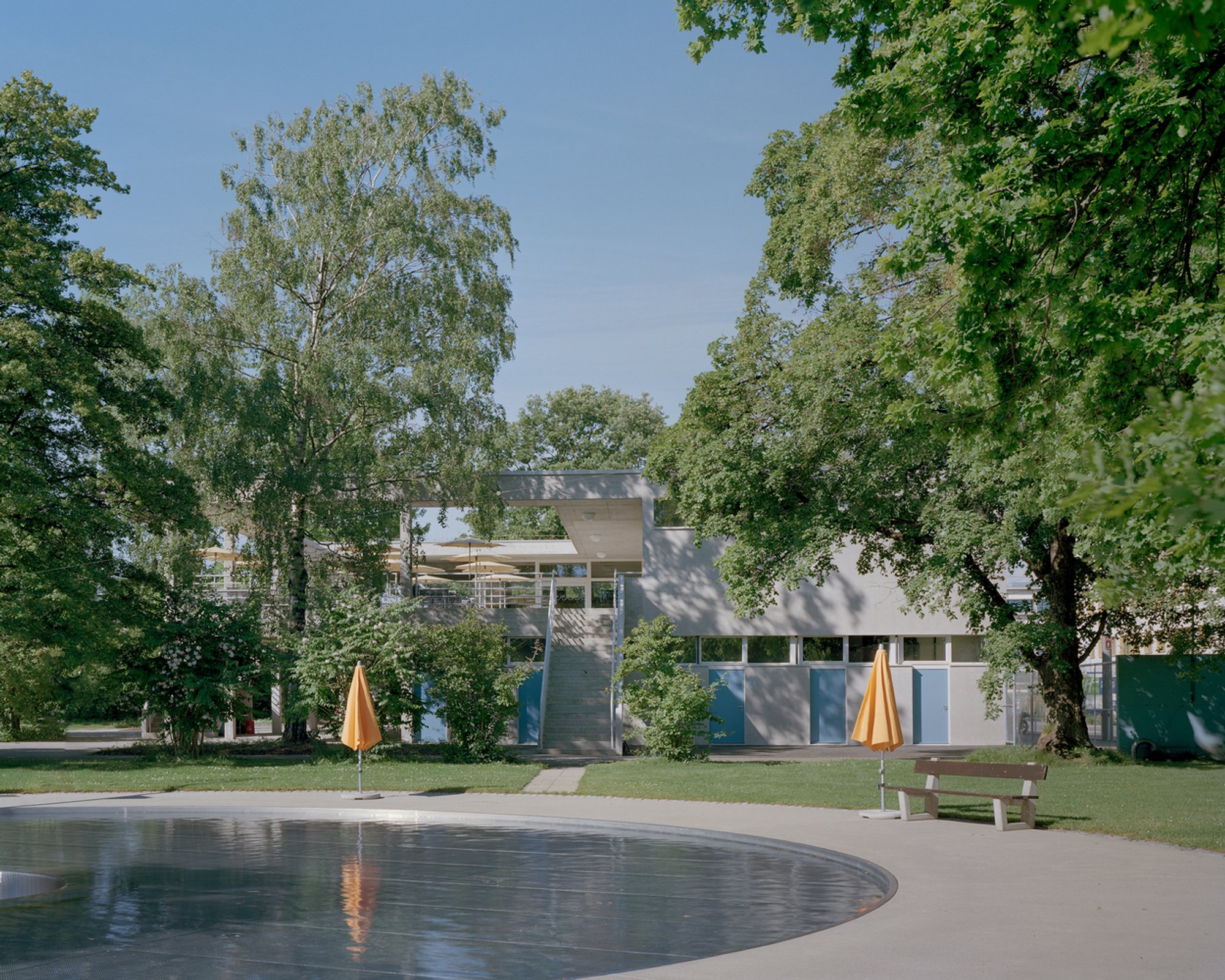 Bachgraben Public Pool Restaurant: Modernist Restoration and Adaptive Reuse by MET Architects