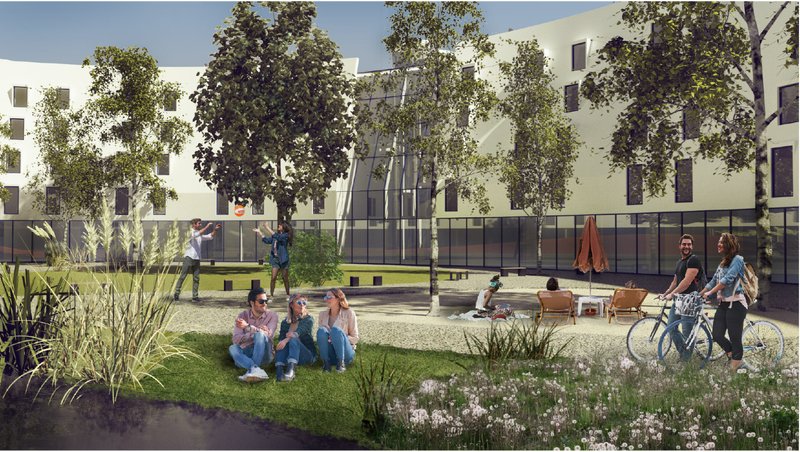 The central lawn offers open green space for play, leisure, and community activities, reinforcing the project’s social-living concept.