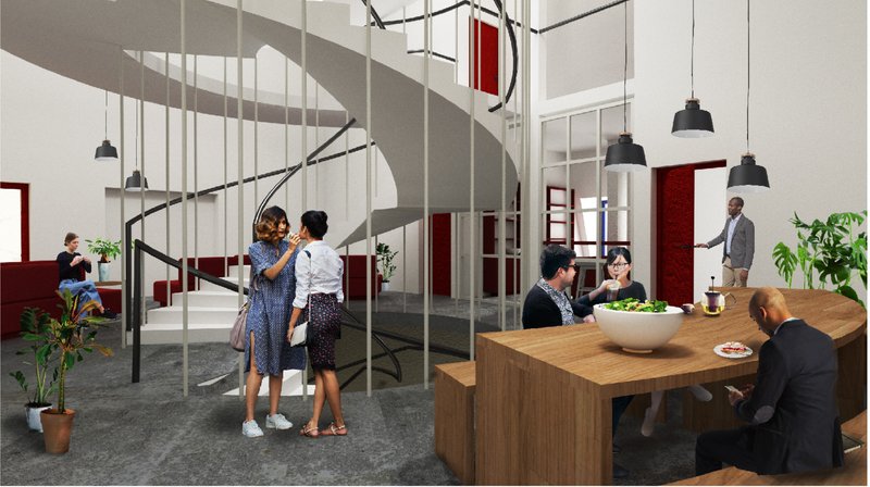 A lively shared interior hub with a spiral staircase, kitchen, and lounge, encouraging interaction and everyday community life.