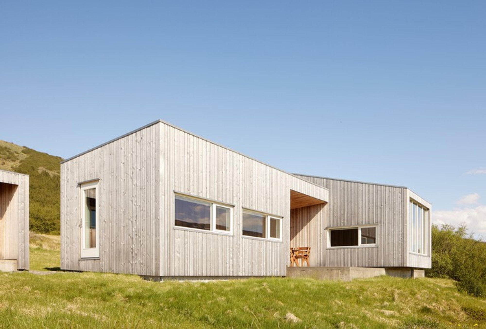 Holiday Home in Iceland: Teiknistofan Tröð's Landscape-Embedded Retreat in Borgarnes