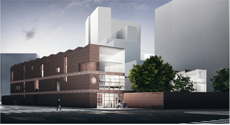 The brick-clad school volume creates a protective urban edge while welcoming families at the main entrance.