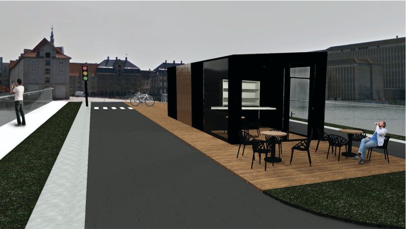 A sleek black pavilion with outdoor seating creates a social stop along the cycling bridge.