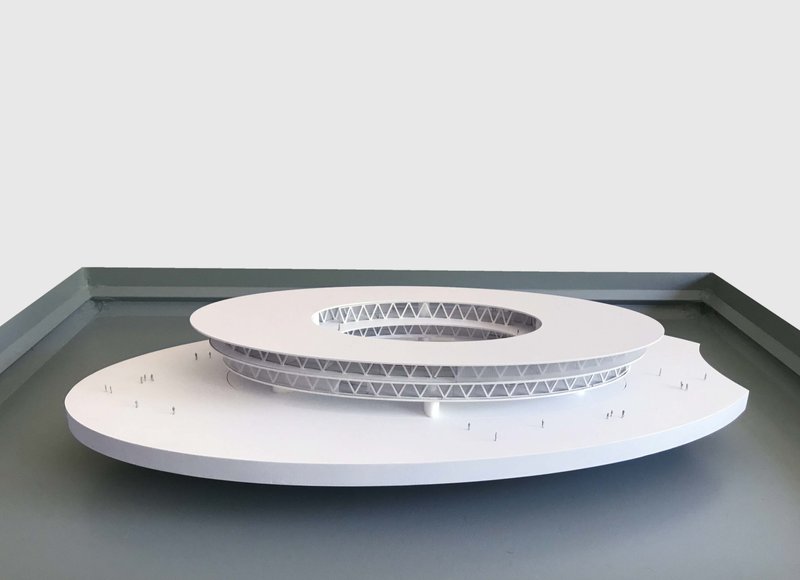 A conceptual model showcasing the project’s elliptical geometry and floating platform system, emphasizing structural clarity and form.