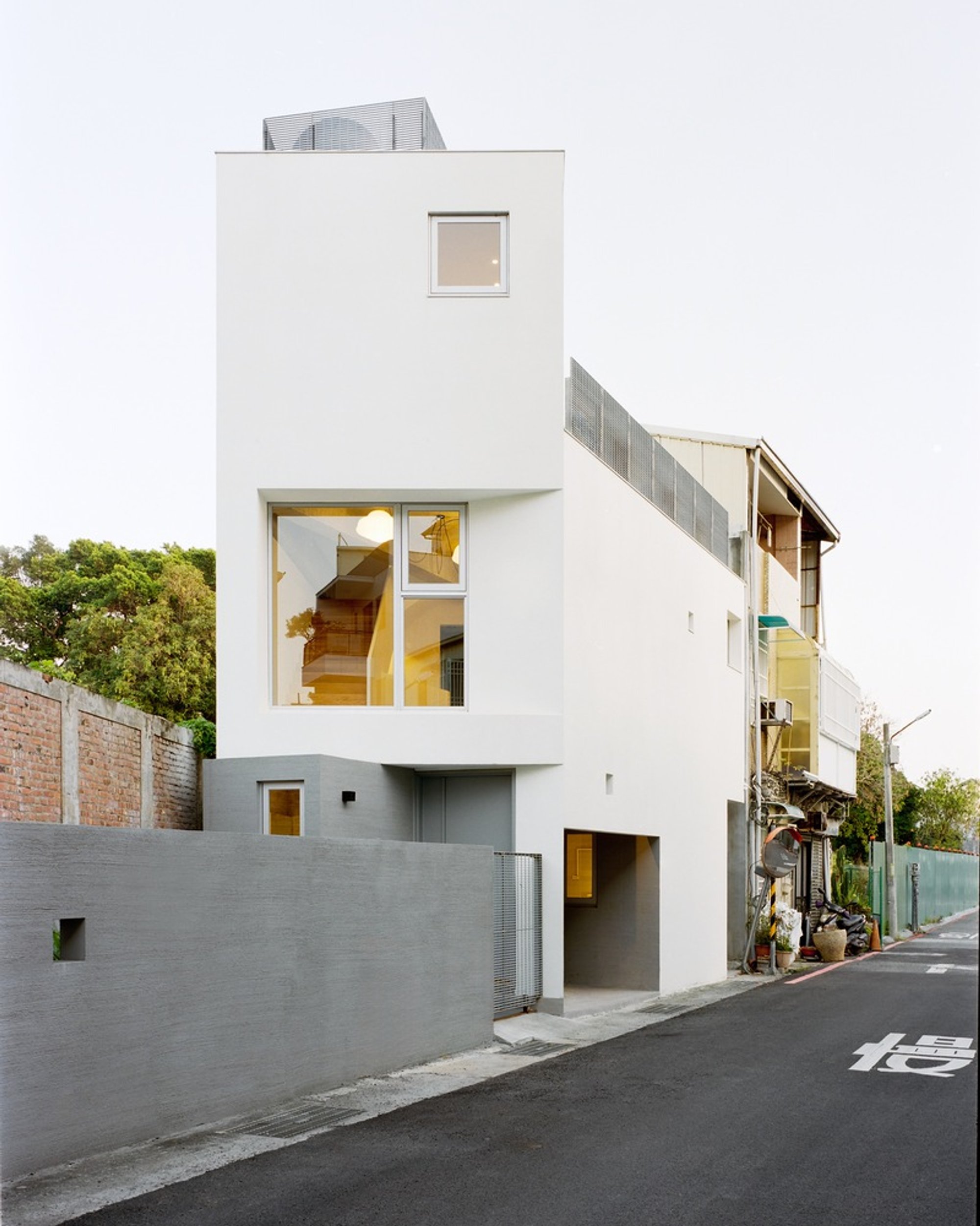 Triangle House Tainan: Compact Triangular-Site Urban Residence by Metrics Architecture Studio