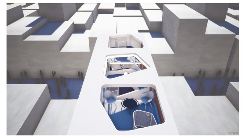 Aerial view revealing open terraces and layered modular units within a dense city fabric.