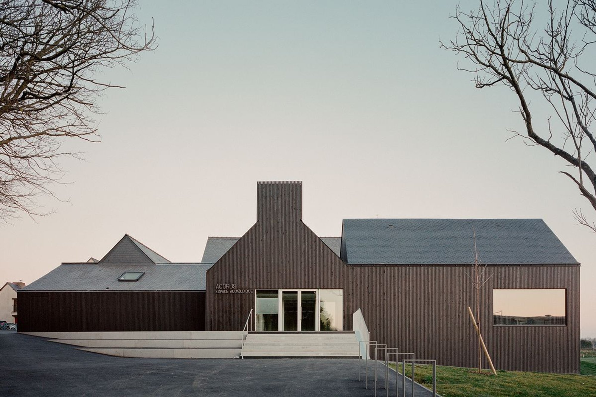 Public Swimming Pool & Spa Renovation in Brittany by RAUM: A Modern Revival of Community Architecture