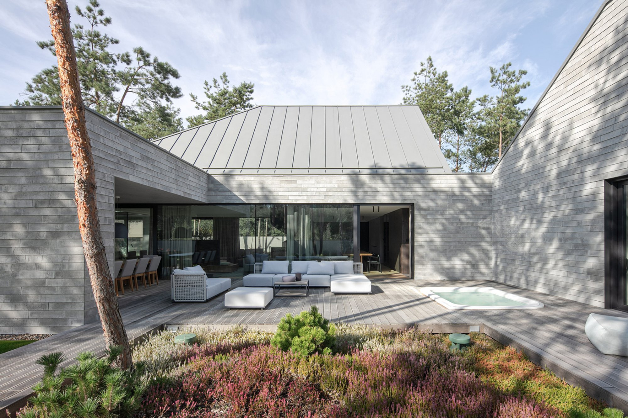 Multi-Unit House by PL.Architekci: A Modern Forest House Design in Poznań