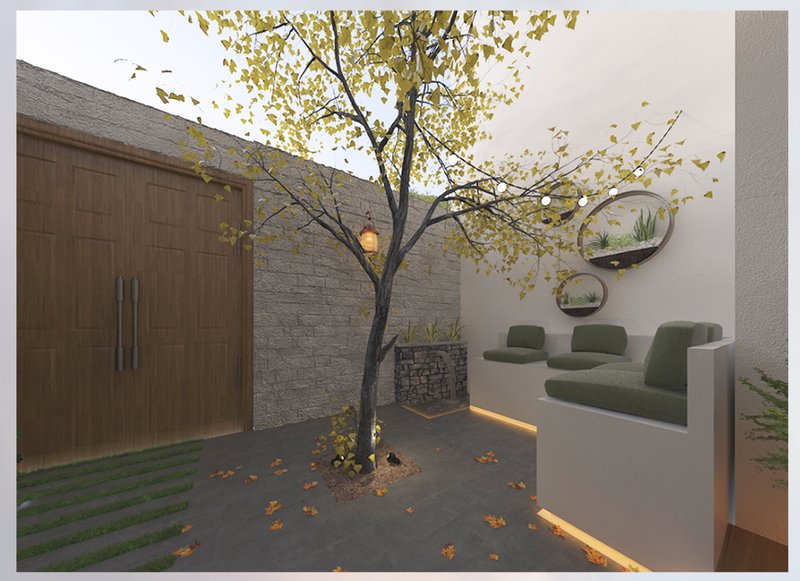 A serene courtyard blends natural elements with Turkish seating traditions, creating a peaceful arrival experience.