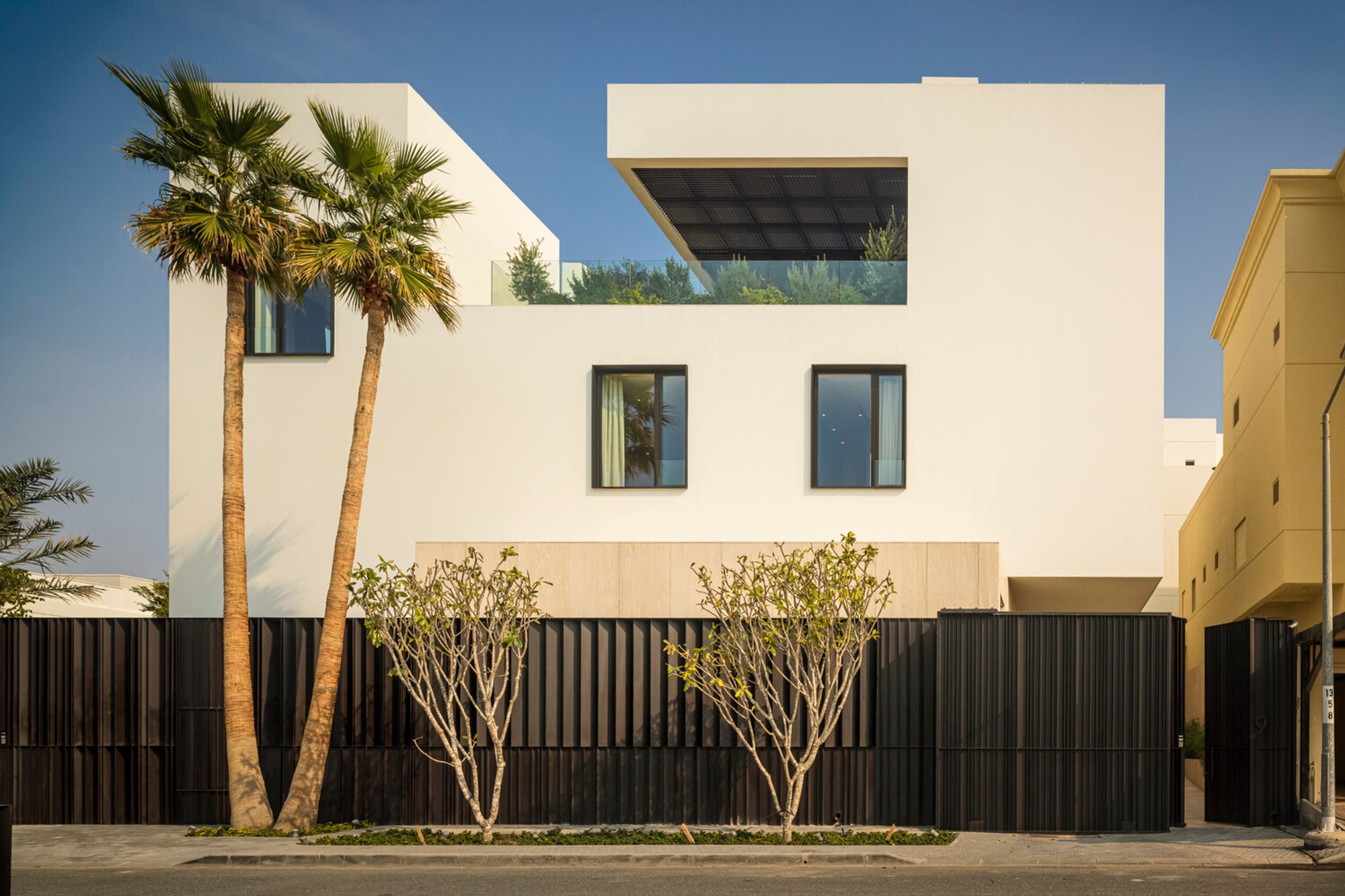 Contemporary House Design in Kuwait: Cleft House by TAEP&AAP